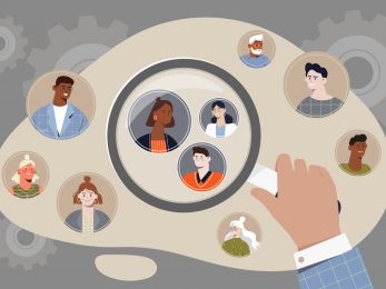 Hand holding magifier to find target audience among other people on grey background